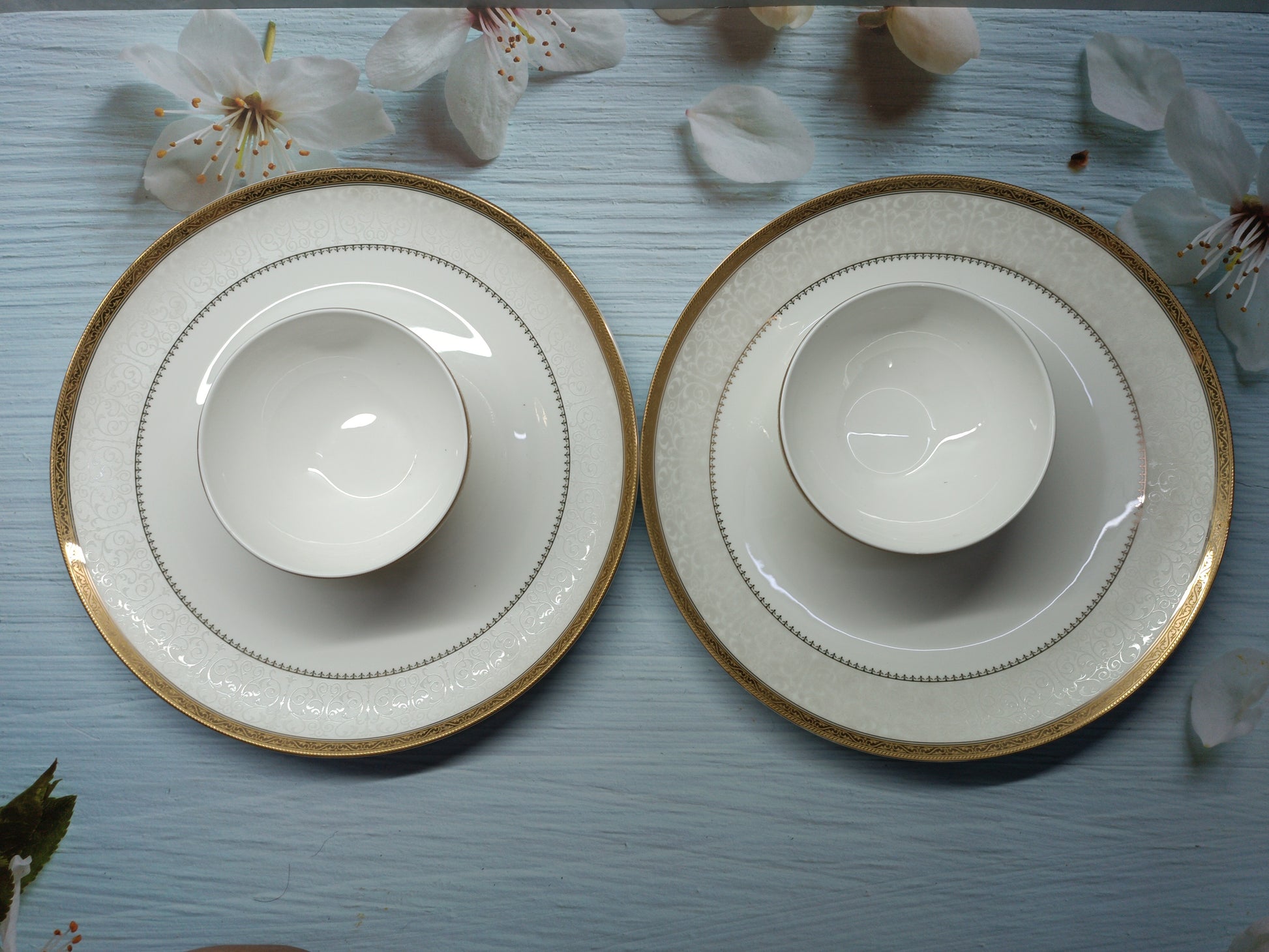 Plate and bowl set made from fine china with elegant golden and silver detailing, perfect for adding a touch of luxury to any dining table or special occasion.